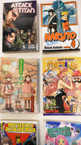 Mangaböckerna Attack of the Titans, Naruto, Yotsuba&!, One Piece, My Hero Academia, Penguin Rumble.